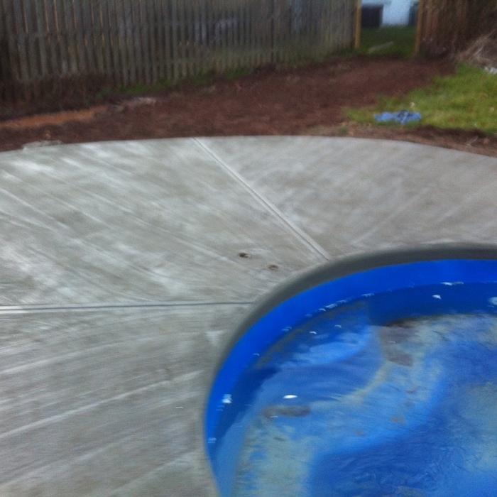 concrecte deck in the pool