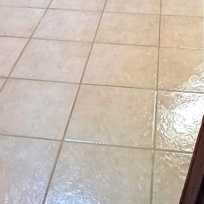 Cleaned, coated floor in health club locker room