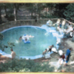 round pool with contracted wooden deck