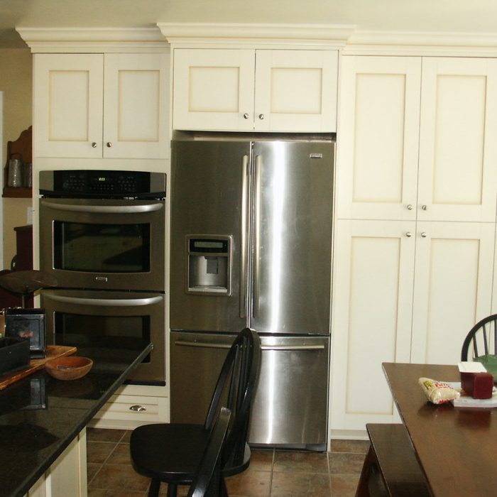 White Floor to Ceiling Cabinetry