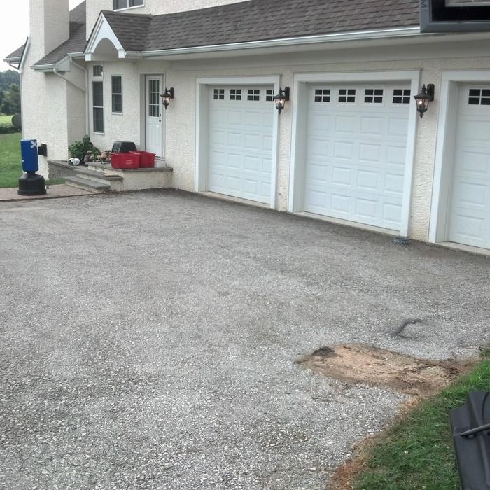Preparing driveway for sealcoating