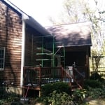 Stain painting on cedar lap siding