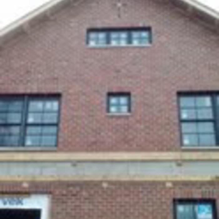 Close up of the front of St. Petronille rectory