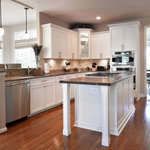 White Kitchen with Walnut Topped Island