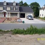 concrete driveway & paver sidewalk