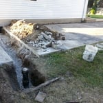New drain and cleanout
