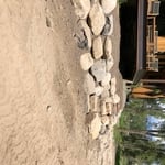 Other side of house retaining wall with stepd