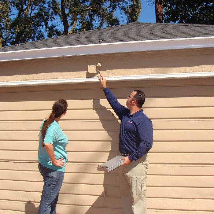 Inspecting exterior electrical with client