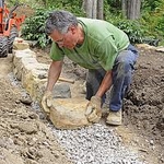 rick laying down base stones