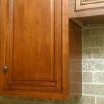completed cabinetry and backsplash install