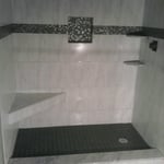 custom shower pan with free standing seat
