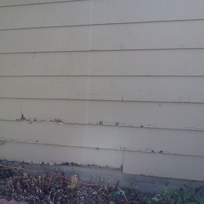 Damaged and worn siding