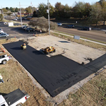 Installing new asphalt parking lot.