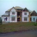framing, blue board insulation, and TyVek house w