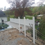 Pool deck, vinyl fence.
