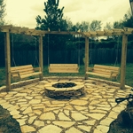 Fire pit, stone walk, wooden swings