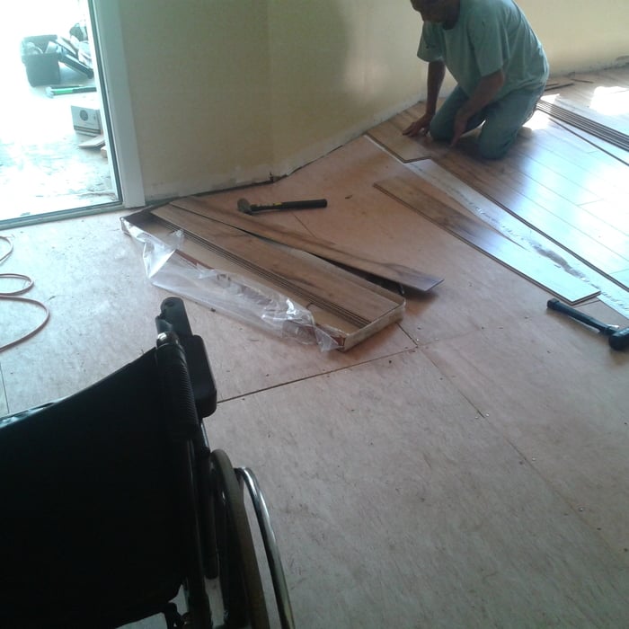 Living room floor being installed