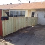 Step down fence with slight curve.