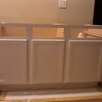 Painted and installing kitchen cabinets