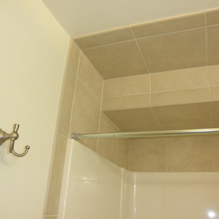 Fiberglas is now framed in tile.