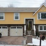 Hardcoat Stucco with Manufactured Stone Veneer