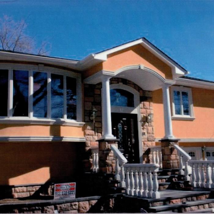 Hardcoat Stucco with Manufactured Stone Veneer