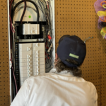 Sam Inspecting a new panel