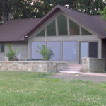 stone wall around front porch
