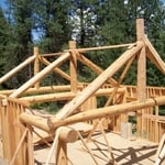 Log trusses over the greatroom.