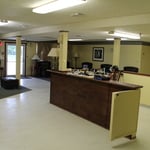 a view of the front receptionist desk and waiting room