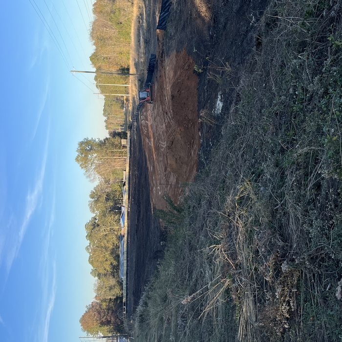 Beginning of fill import, spread, and compaction.