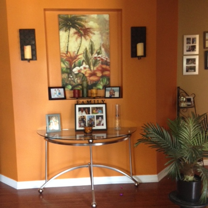 Foyer area painted in catching tropical colors