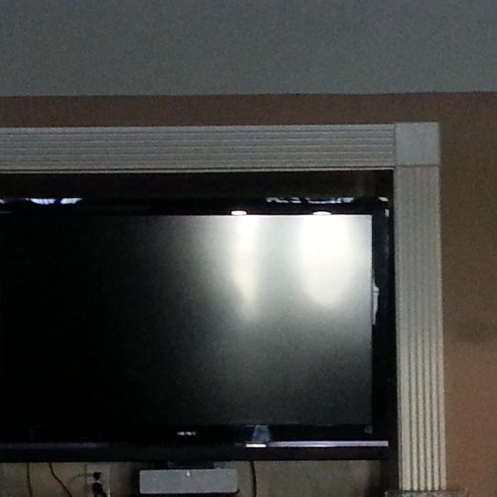 55" in recessed hole in living room