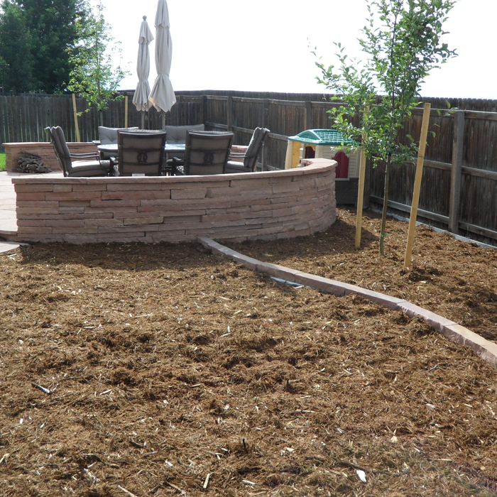Landscaping and patio area , and Fence