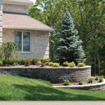 Front retaining wall system