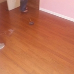 Finished laminate flooring with trim