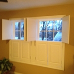 Custom built raised panel shutters