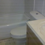 tub, vanity, toilet, replaced (after)