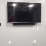 65" TV with sound bar and share device