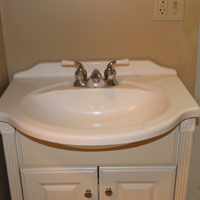installed this sink & cabinet along with painting.