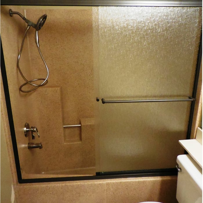 new shower doors and refinished in natural accent