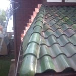 Tile and copper re-installed