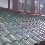 Tile and copper re-installed