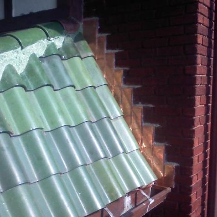 Tile and copper re-installed