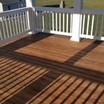 pressure wash rails and deck and stain decks