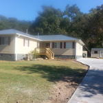 New metal roof, deck and concrete driveway