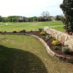 Mortared stone flower bed and landscaping