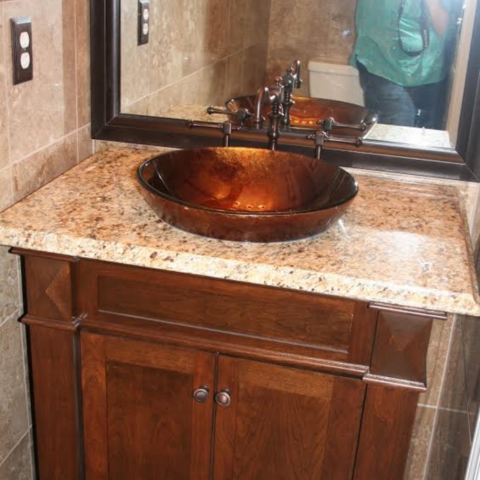 Custom cherry vanity and glass sink