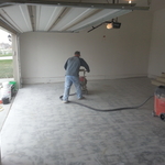 Sanding the concrete