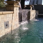 Pool tile wall at waterfall